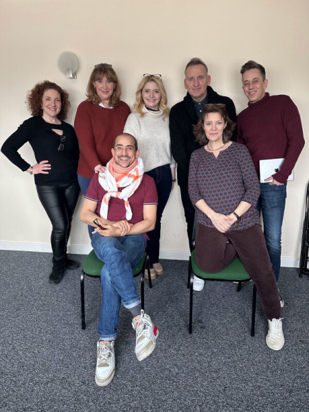 Clockwise from left_ Helen Goldwyn, Rosalyn Landor, Eliza Shea, Christopher Eccleston, Gary Jordan, Lisa Bowerman, Nabil Elouahabi